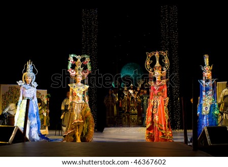ULAN-UDE, RUSSIA - OCTOBER 29: Asian models demonstrate dresses in ethnic style at the international asian fashion festival on October, 29, 2009 in Ulan-Ude, Buryatia, Russia.