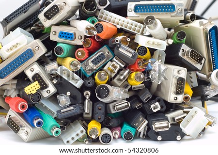 lots of plugs of different computer cords