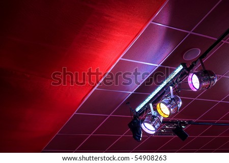 set of stage suspended spotlights under ceiling, copy space