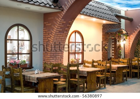 restaurant interior imitating places outside a european cafe or a bistro