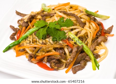 pasta with meat and vegetables, seasoned with tomato sauce
