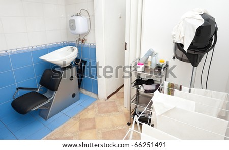 special equipment at a hairdressing salon - a sink, a dryer, a hairdryer