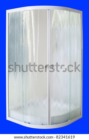 a shower cubicle with frosted sliding doors