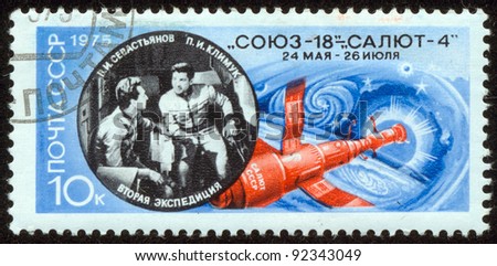 SOVIET UNION - CIRCA 1975: A stamp printed by the Soviet Union Post shows Russian cosmonauts Sevastyanov and Klimuk piloted the spacecraft \