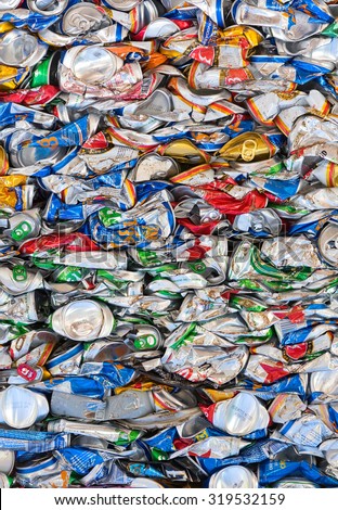 VUNG TAU, VIETNAM - AUGUST 28, 2015: A lot of empty beer cans deformed because of compression. Pollution and garbage utilization have become global problems of the earth.