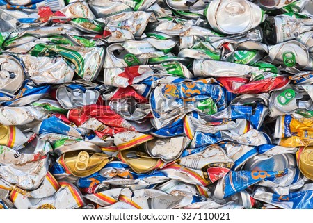 VUNG TAU, VIETNAM - AUGUST 28, 2015: A lot of empty beer cans deformed because of compression. Pollution and garbage utilization have become global problems of the earth.