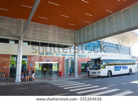 CAM RANH, VIETNAM - OCTOBER 8, 2015: A bus of Pegas Touristik unloads passengers at the international terminal of the Cam Ranh Airport. Pegas Touristik is a big Russian tour operator.