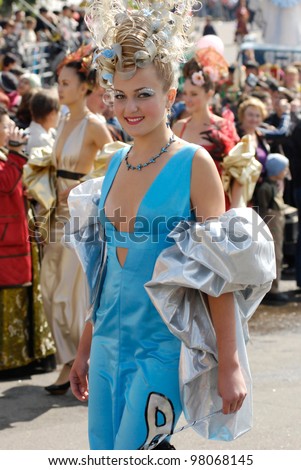 ULAN-UDE, RUSSIA - SEPTEMBER 6: An unidentified female model of the Model Agency by Sofia Nee takes part in the City parade on annual City Day, September 6, 2008 in Ulan-Ude, Buryatia, Russia.