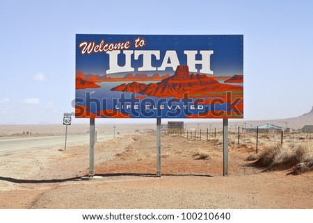 MONUMENT VALLEY - March, 24: Governor\'s office reports 20.2 million tourists visited Utah during 2010. Large welcome sign greets travels on March 24, 2012, in Monument Valley, Utah.
