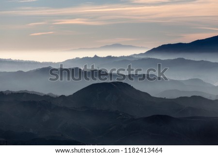 Misty hills and canyons in the San Gabriel Mountains foothills north of Los Angeles in scenic Southern California.