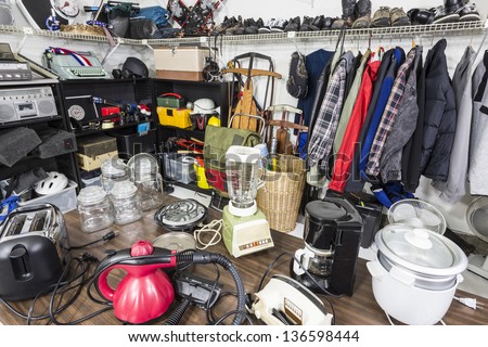 Interior Garage Sale, Housewares, Clothing, Sporting Goods And Toys.