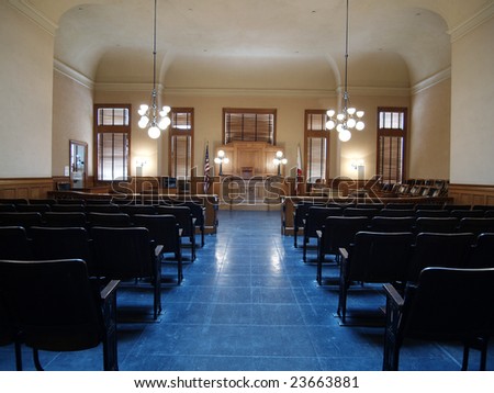 Empty seats inside a classic American courtroom.