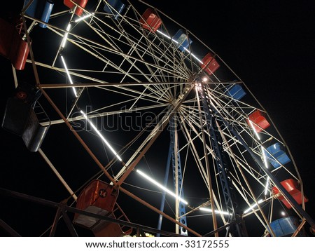 Vintage Ferris Wheel in a traveling carnival.