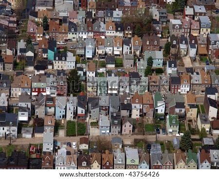 Aerial photo of rust belt row homes in a large midwest US city,