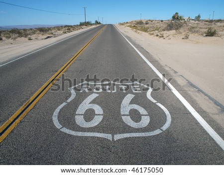 Historic Route 66 crossing California\'s mojave desert.
