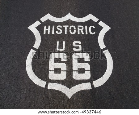 Historic US Route 66 pavement road sign in California\'s Mojave desert.