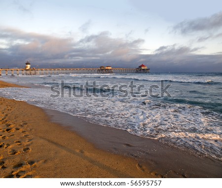 Famous Huntington Beach pier during a Southern California sunset.