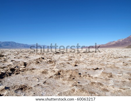 Crusty mud flats at Bad Water lake in Death Valley National park, California.