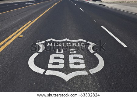 Route 66 pavement sign on a four section of the historic highway.