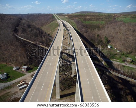 Empty highway bridges through a rural section of the eastern United States.