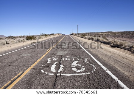 Decayed section of historic Route 66 through California\'s vast Mojave desert.