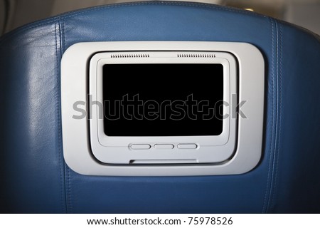 First class seat back with monitor on a common jet aircraft.