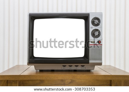 Vintage portable television on old craftsman style table with cut out screen and clipping path.