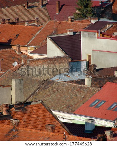 Urban scene across built up area showing roof tops