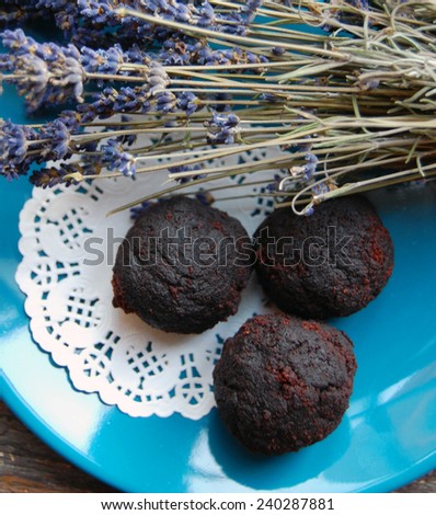 dark chocolate truffles with lavender on a dessert plate