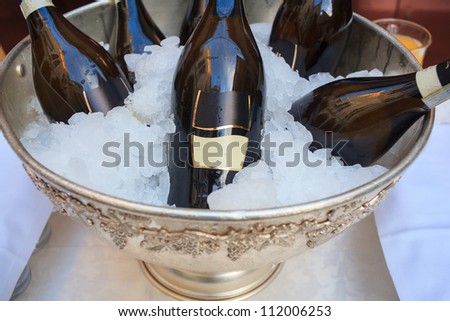 Buffet, Wine bottles in silver cold ice bucket