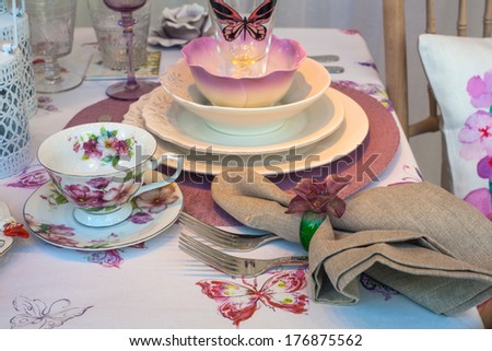 View of ceramic dishes of the elegant table set