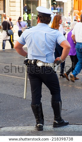 MILAN, ITALY - MAY, 18: Traffic officer on the road on May 18, 2014