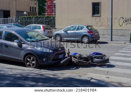 MILAN, ITALY -  APRIL, 16: Scooter crash in the urban street on April 16, 2014