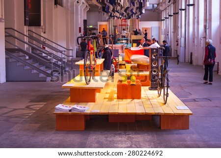 MILAN, ITALY - APRIL 16: People visit Fuorisalone at Tortona space location of important events during Milan Design week on April 16, 2015