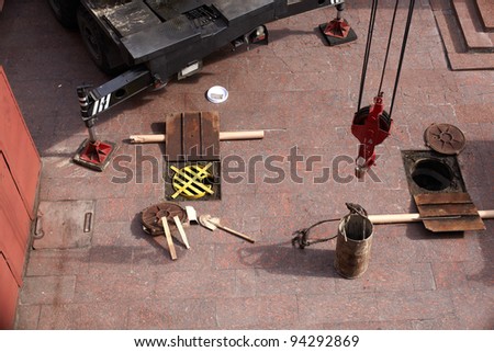Tools next to the Manhole opened for maintenance