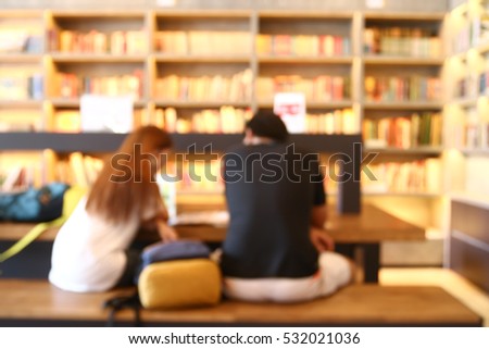 Blurred background  people read in a university library.