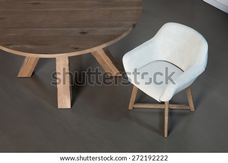 Wooden round table isolated with chair