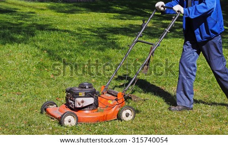 City workers - summer lawn mowing