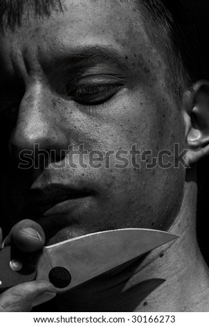A man shaving with knife