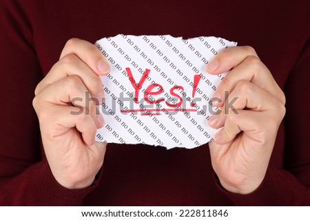Piece of paper with red word \