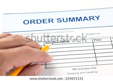 Order summary application form and human hand with pencil