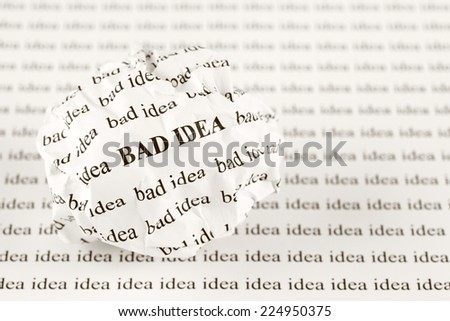 Crumpled paper ball with words 