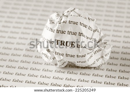Crumpled paper ball with words \