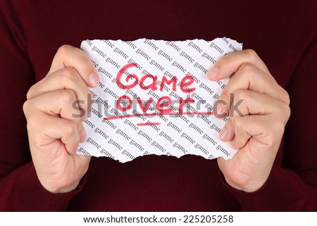 Piece of paper with red word \