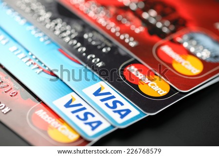 Tambov, Russian Federation - September 11, 2012: Visa and Mastercard logos on credit cards. Studio shot. Visa and Mastercard are a two biggest credit card companies in the world.