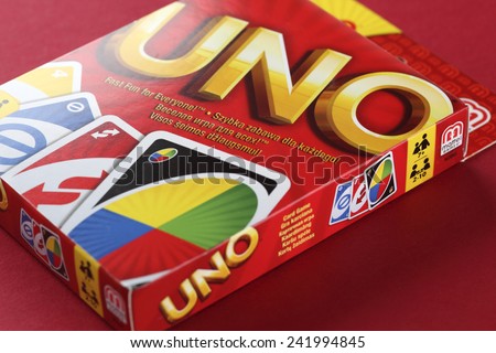Tambov, Russian Federation - August 15, 2013 Box of UNO game on red background. Studio shot. The game has been a Mattel product since 1992.