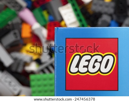 Tambov, Russian Federation - January 12, 2015 Lego logo on the box with Lego blocks background. Adobe RGB. Studio shot.