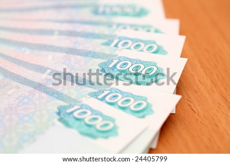 One Thousand Ruble Notes on desk. Closeup