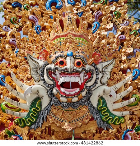 Traditional Barong mask pattern in temple - protective spirit, Bali island symbol. Featured in Balinese dances and ceremonies. Culture, religion, Arts festivals of Indonesian people. Travel background