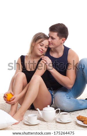 happy young couple eat breakfast in morning, lovely couple, happy smile kissing, concept of honeymoon, valentine day